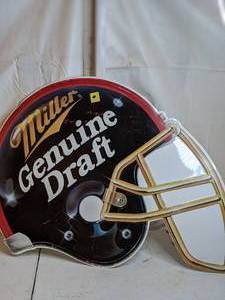 lot 1025 image: Miller Genuine Draft Football Helmet Metal Advertising Sign