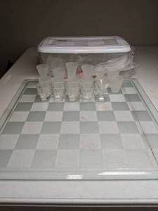 lot 1172 image: Shot Glass Chess Set with Glass Chessboard