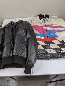 lot 1190 image: 2 Leather Bomber Jackets - Polaris and Ditch Witch