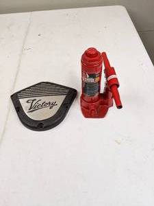 lot 1446 image: 2 Ton Bottle Jack and Victory Motorcycle Wall Decor
