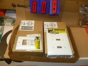 Flat of New Electrical Parts. As shown.
