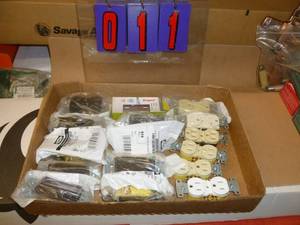Flat of New Electrical Parts. As shown.