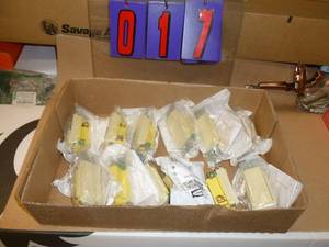 Flat of New Electrical Parts. As shown.