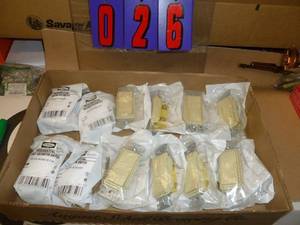 Flat of New Electrical Parts. As shown.
