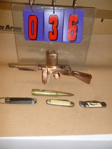 Thompson lighter & misc knives. As shown.