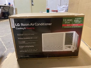 LG Electronics 12,000 BTU 230208-Volt Window Air Conditioner with Cool, Heat and Remote in White New Condition See Pictures