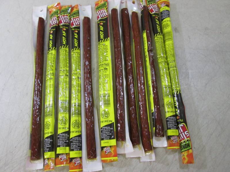 lot 196 image: 12 Slim Jim Hot AF Smoked Snack Sti...