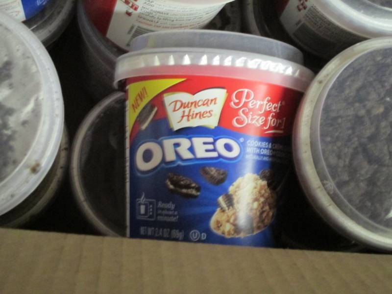 lot 10 image: 5B Case of 12 Duncan Hines Oreo C...