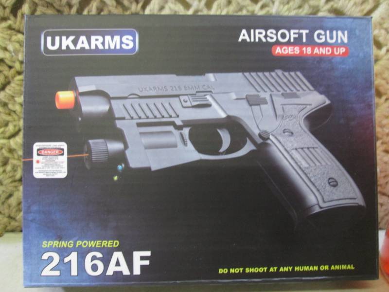 lot 104 image: Pistol Airsoft Gun with Laser and B...