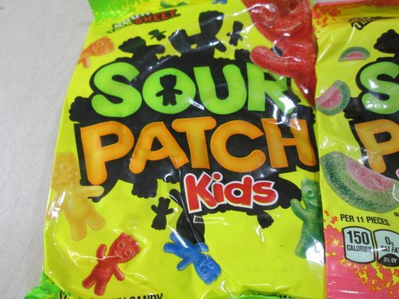 lot 277 image: Assorted Bags Sour Patch Kids Candy...