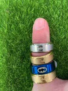 Lot of 4 Batman Rings Size 9, 9, 10, 11