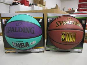 2 Womens Spalding Basketballs...