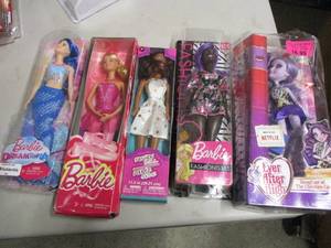 5 Barbie Dolls...