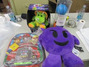 Stuffed Animals, Balls, and a Paw P...