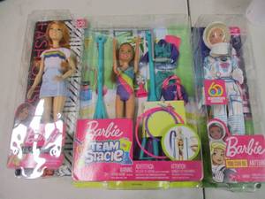 2 Barbie Dolls and a Barbie Set...