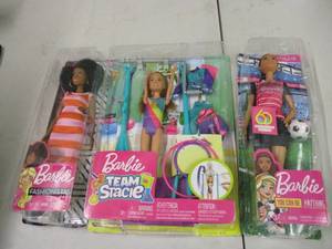 2 Barbies and a Barbie Set...