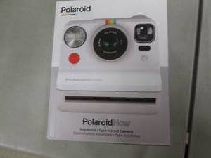 lot 144 image: Polaroid Instant Camera open box...
