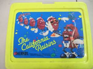 lot 58 image: The California Raisins Lunch Box an...