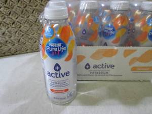 lot 186 image: (C-2) Case of 12 Bottles Nestle Pur...