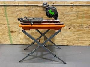 lot 43 image: RIDGID 9 Amp Corded 7 in. Wet Tile Saw with Stand