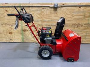 lot 4 image: TROY-BILT 24 in. 208 cc Two-Stage Gas Snow Blower with Electric Start Self Propelled