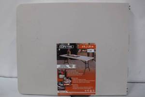 lot 31 image: 6 ft. Fold-in-Half Table Almond
