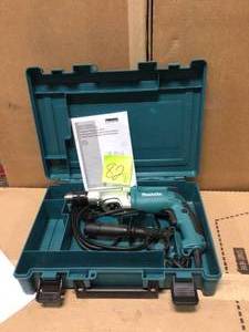 6.6 Amp 34 in. Corded Hammer Drill with Torque Limiter Side Handle Depth Gauge Chuck Key Hard Case by Makita in good condition&nbsp