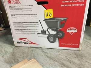 125 lb. 2.5 cu. ft. Tow Behind Broadcast Spreader by Brinly-Hardy IN GOOD CONDITION