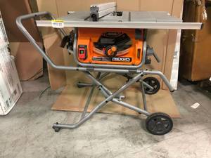 15 Amp 10 in. Table Saw with Folding Stand by RIDGID in working conditions