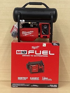 lot 1 image: Milwaukee Cordless Compressor