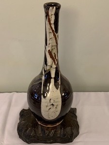 lot 103 image: Large Decorative Pottery Vessel on Wooden Base