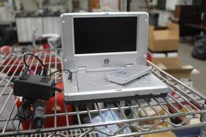 lot 18 image: Digital Labs Portable DVD  CD Player, Remote Control, Car Power Supply