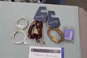 lot 48 image: Lot of (5) Jewelry - Bracelets (x4), Claires Nose Gems (x1)