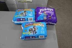 lot 151 image: Lot of (3) Diapers - Huggies Pull-Ups Toy Story 18-count Training Pants Sizes 4T-5T (x2), Huggies Pull-Ups 23-count Sizes 2T-3T (x1)