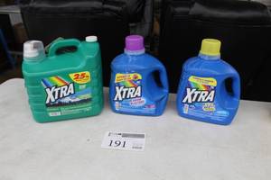 lot 191 image: Lot of (3) Xtra Mountain Rain 210 Load he Laundry Detergent 2.46-Gallon Plastic Bottle, Fresh Rain 96 Load he Laundry Detergent 1.36-Gallon Plastic Bottle, Crystal Clean 96 Load he Laundry Detergent 1.36-Gallon Plastic Bottle