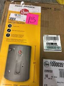 lot 13 image: Performance 10 gal. 6-Year 2000-Watt Single Element Electric Point-Of-Use Water Heater by Rheem in working condition. HAS DENT PLEASE SEE PICS CAREFULLY 