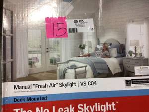 lot 15 image: 21 x 37-78 in. Fresh Air Venting Deck-Mount Skylight with Laminated Low-E3 Glass by VELUX in good condition 