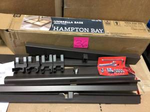 lot 36 image: Steel Outdoor Patio Umbrella Base in Brown by Hampton Bay