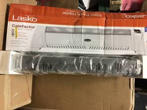 lot 66 image: Low Profile 1500-Watt Electric Silent Room Space Heater with Digital Display and Tip-Over Safety Switch, White by Lasko see pics carefully  