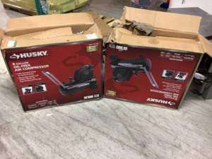 lot 109 image: 2 cases of 8G 150 PSI Hotdog Air Compressor by Husky in good condition