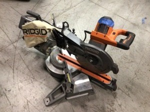 lot 112 image: Ridgid 12 in. Dual Bevel Sliding Miter Saw R4221 in working conditions