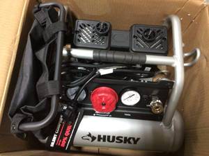 1 Gal. Portable Electric-Powered Silent Air Compressor by Husky in good condition
