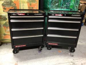 Lot of two  26 in. W 4-Drawer Rolling Cabinet Tool Box in Gloss Black by Husky Customer returns