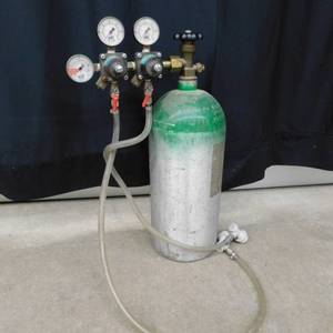 FULL ALUMINUM CO2 CYLINDER WITH GAGES.