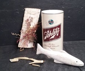 SCHLITZ GARBAGE CAN AND HAND CARVED FISH