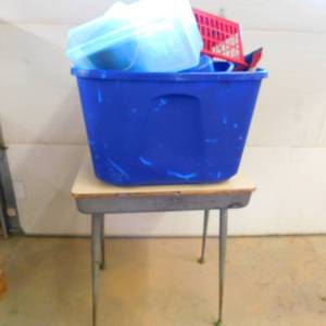 PLASTIC STORAGE CONTAINERS AND A DESK