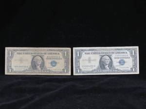 lot 24 image: 2 1957-A $1 Silver Certificates