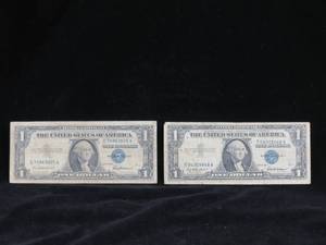lot 26 image: 2 1957 $1 Silver Certificates