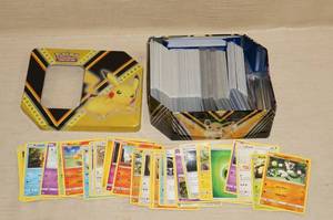 lot 49 image: Metal Tin of Pokemon Cards