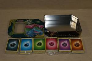 lot 48 image: Metal Tin of Pokemon Energy Cards